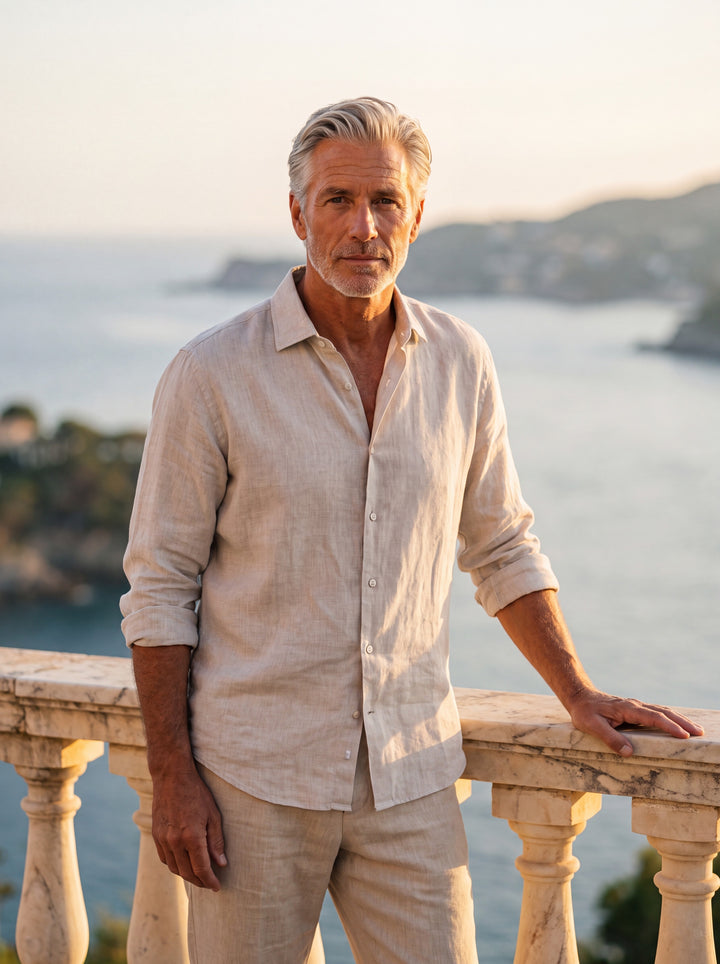 Alden Men linen shirt in white, worn by a model on a Mediterranean terrace - Gentlemens Manor lifestyle