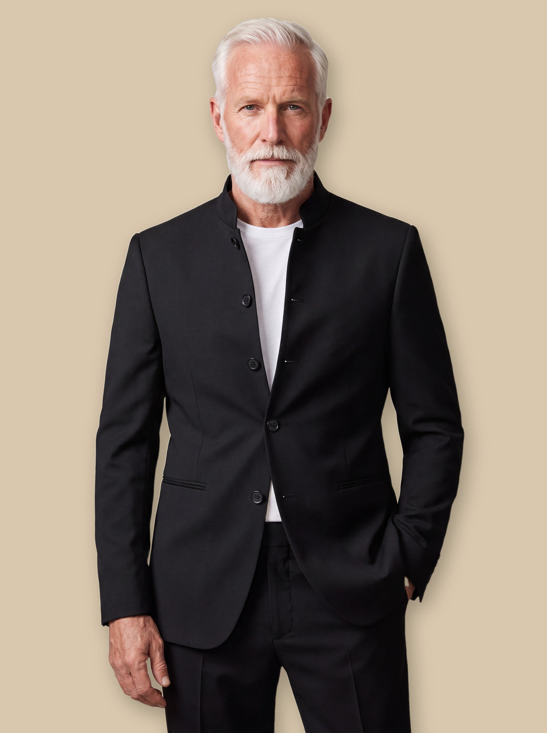 Aldrich blazer suit in Black, worn by a model on a warm sand studio background - Gentlemens Manor