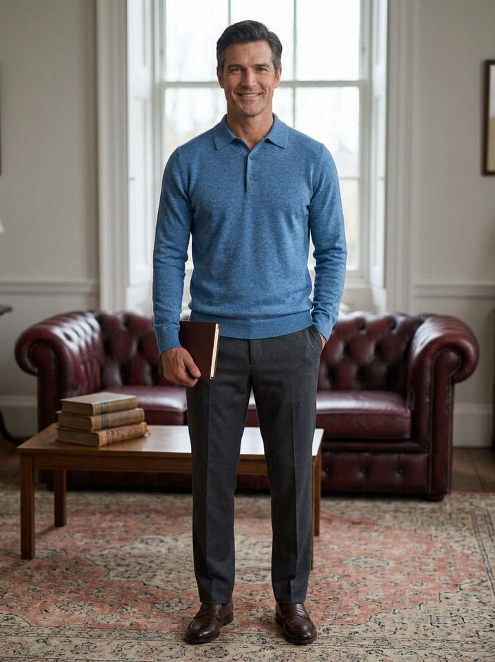 Ashcombe polo sweater in Blue, lifestyle in a club reading room, Gentlemens Manor