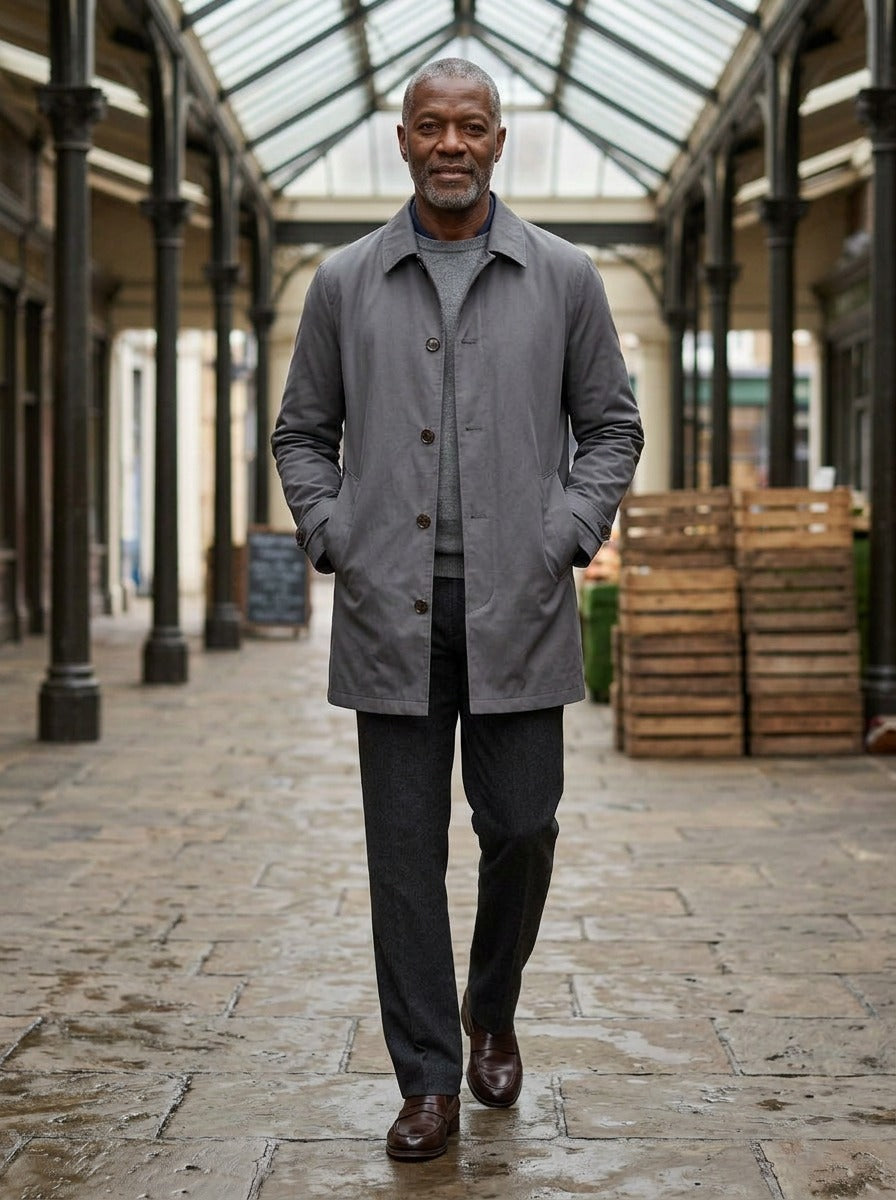 Aubrey single breasted mac coat in Grey, lifestyle in a covered market hall, Gentlemens Manor