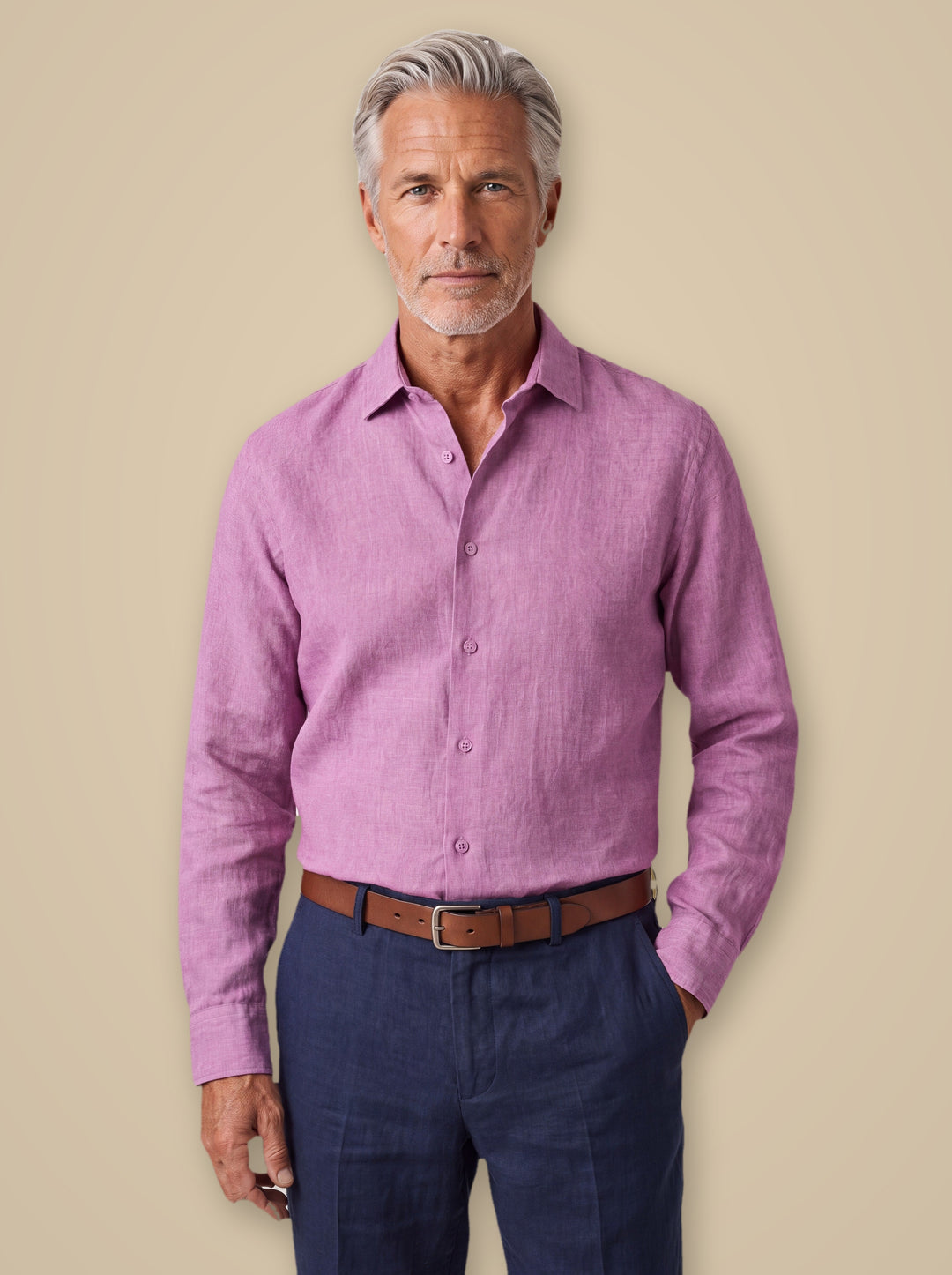 Augustus linen shirt in Pink, worn by a model on a warm taupe studio background - Gentlemens Manor