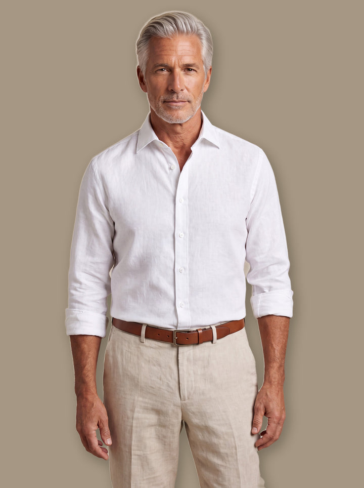 Austin linen shirt in White, worn by a model on a warm taupe studio background - Gentlemens Manor