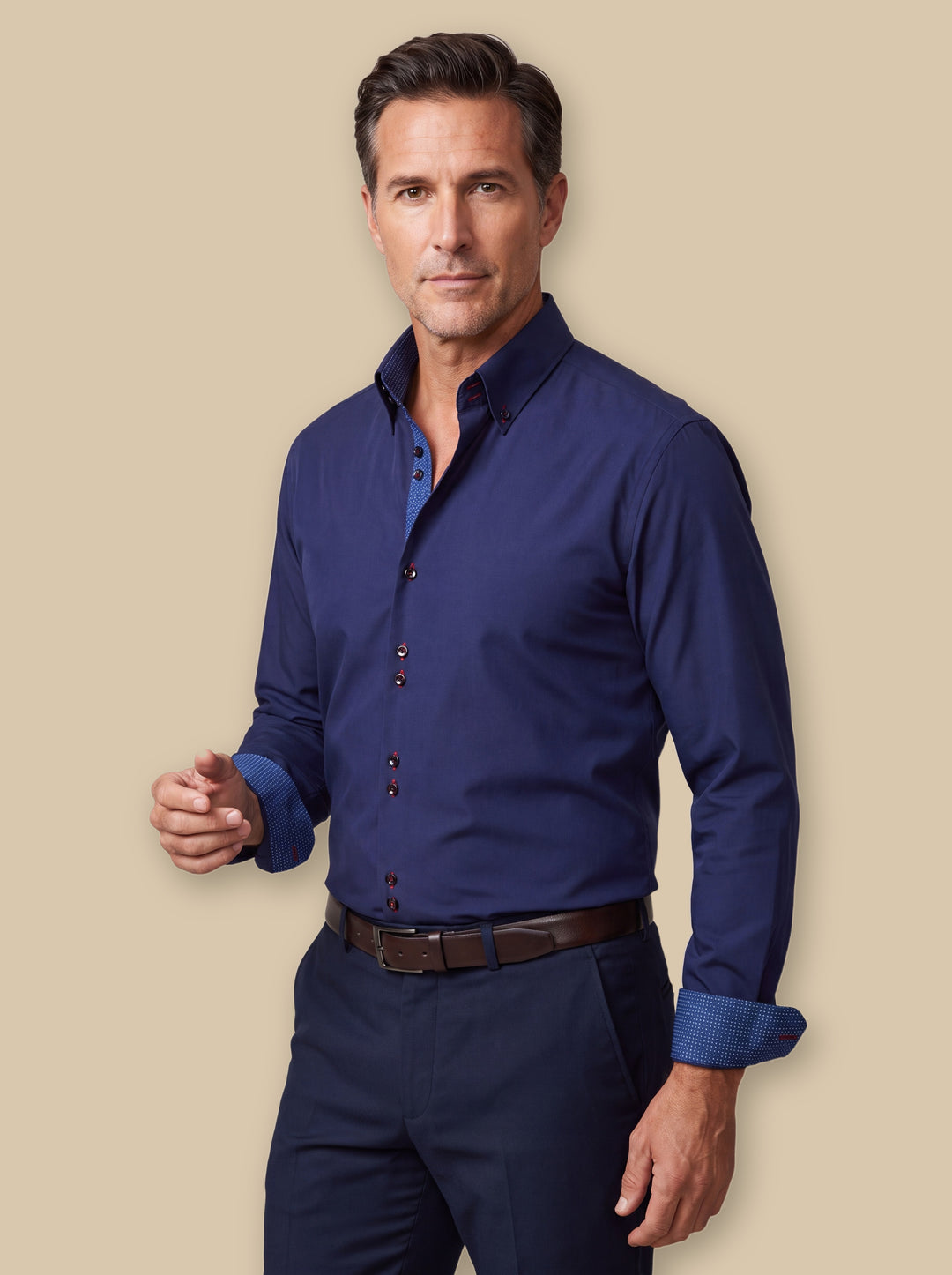 Barrett dress shirt in Navy, worn by a model on a warm sand studio background - Gentlemens Manor