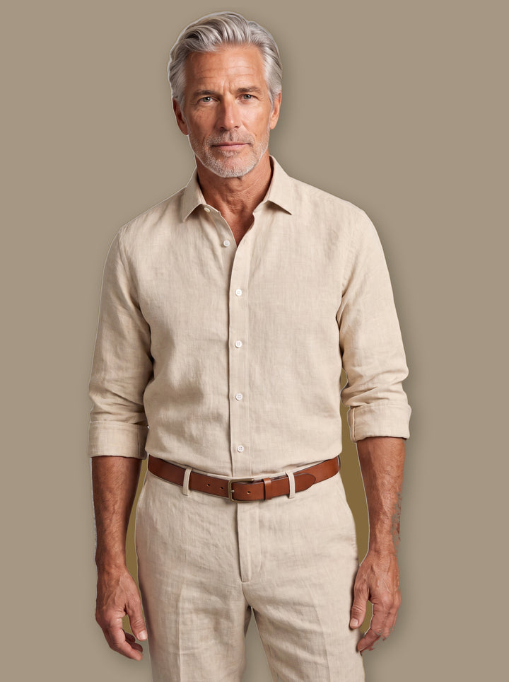 Bartholomew linen shirt in Sand, worn by a model on a warm taupe studio background - Gentlemens Manor