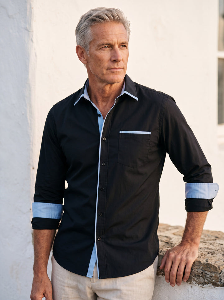 Beau shirt in Black, worn by a model in a Mediterranean setting - Gentlemens Manor lifestyle