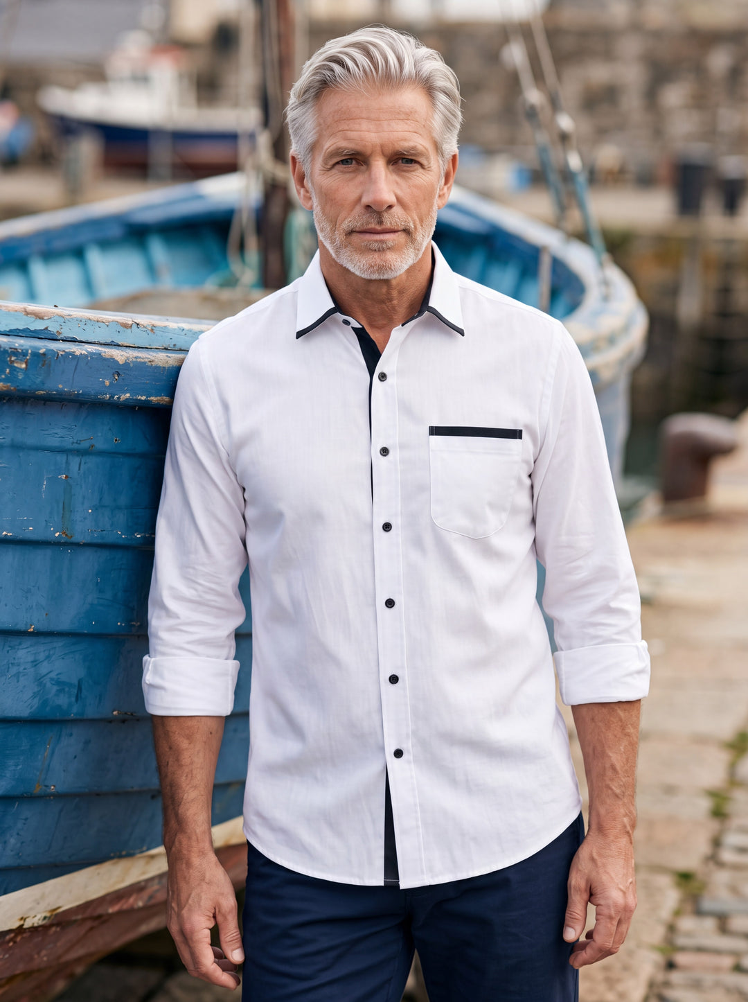 Beau shirt in White, worn by a model in a Mediterranean setting - Gentlemens Manor lifestyle