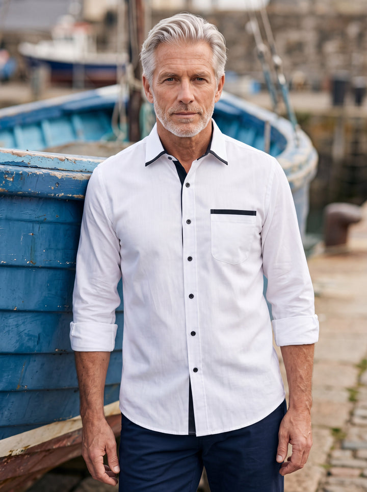Beau shirt in White, worn by a model in a Mediterranean setting - Gentlemens Manor lifestyle