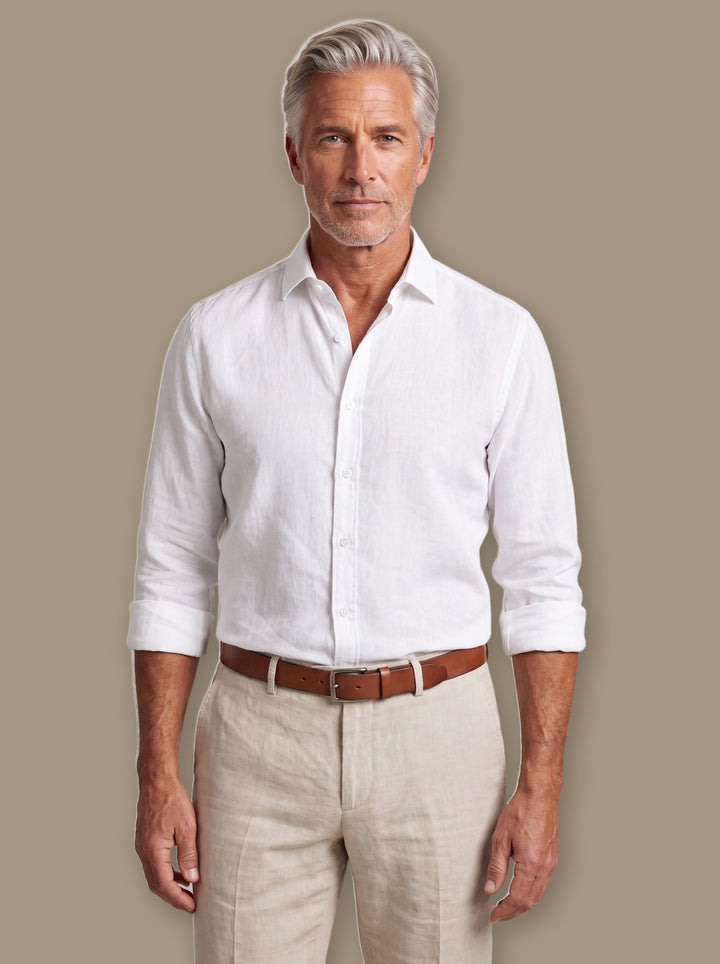 Bennett linen shirt in White, worn by a model on a warm taupe studio background - Gentlemens Manor