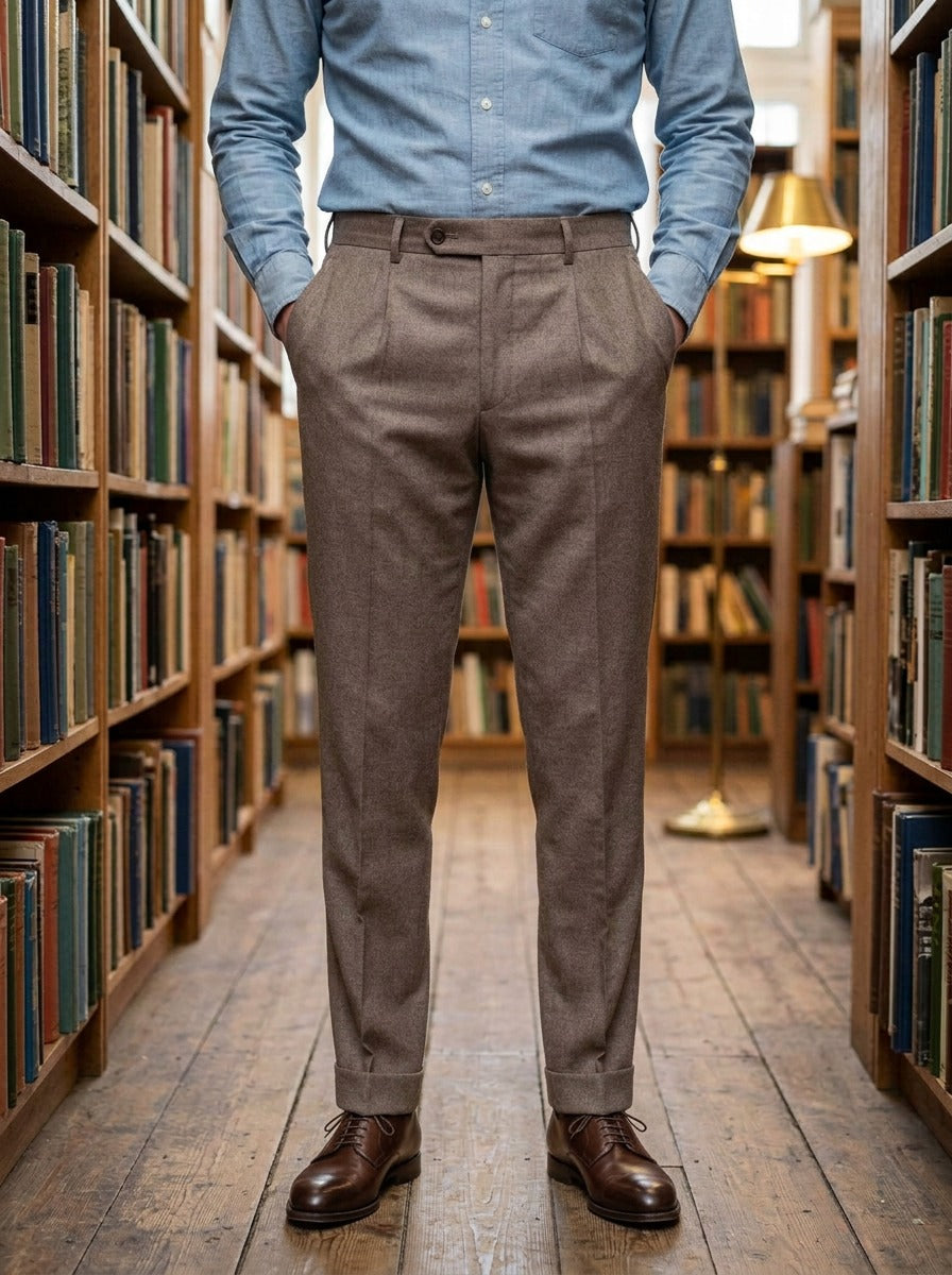 Benton slim tapered pleated trousers in Brown, lifestyle in a secondhand bookshop, Gentlemens Manor