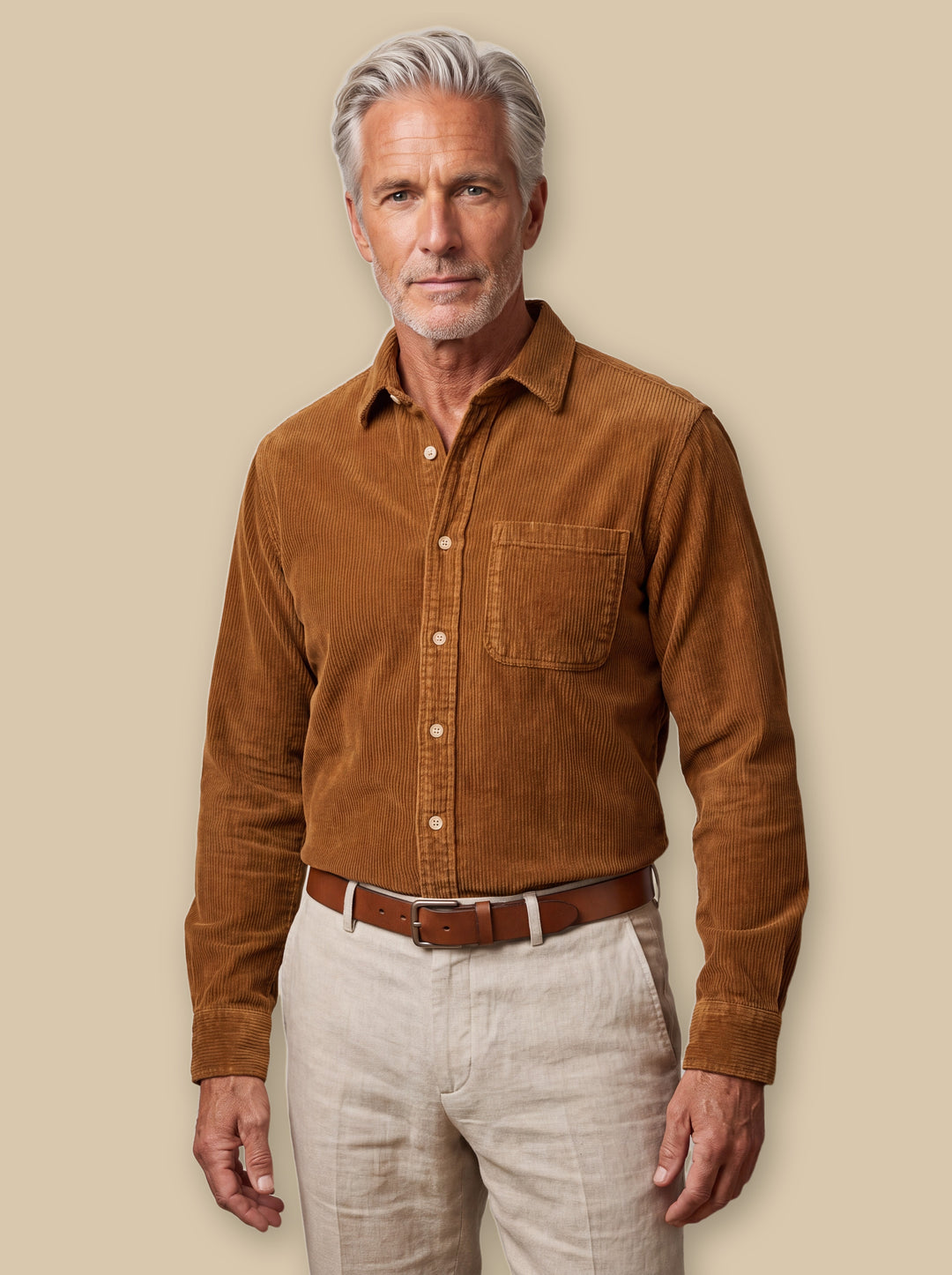Bishop casual shirt in Brown, worn by a model on a warm sand studio background - Gentlemens Manor
