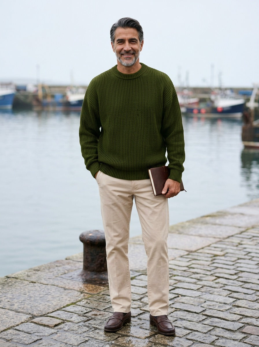 Bowen chunky ribbed crew neck sweater in Olive, lifestyle on a stone harbor quay, Gentlemens Manor