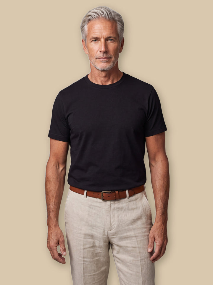 Boyd casual shirt in Black, worn by a model on a warm sand studio background - Gentlemens Manor