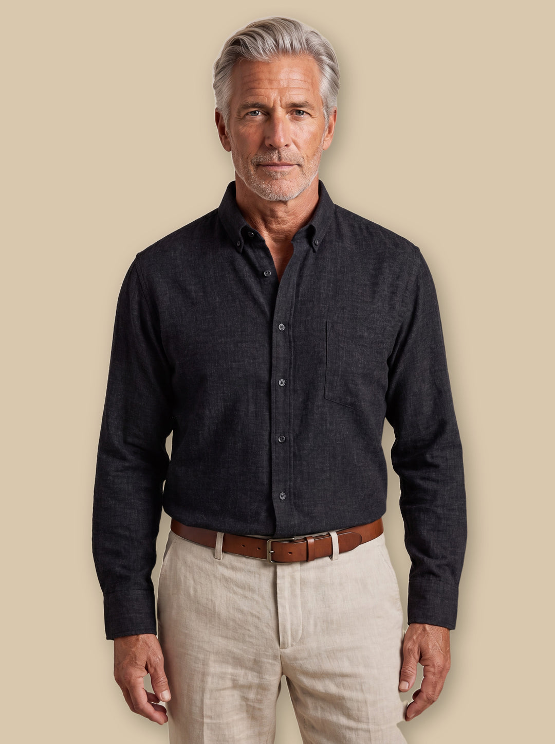 Bradley casual shirt in Black, worn by a model on a warm sand studio background - Gentlemens Manor