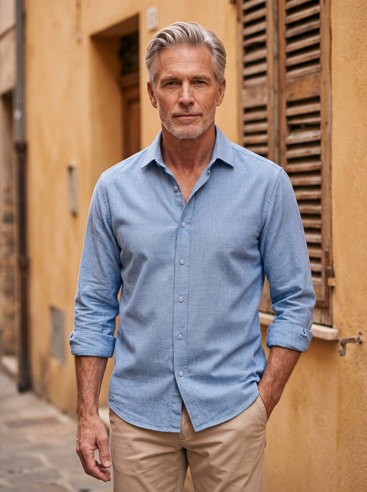 Bradley shirt in Light Blue, worn by a model in a Mediterranean setting - Gentlemens Manor lifestyle