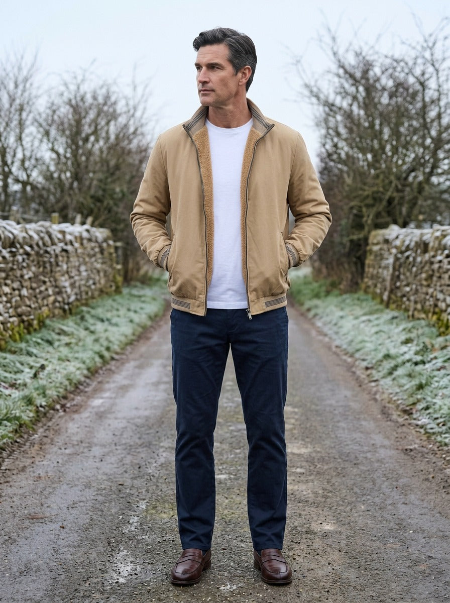 Bramley sherpa lined bomber jacket in Sand, lifestyle on a country lane, Gentlemens Manor