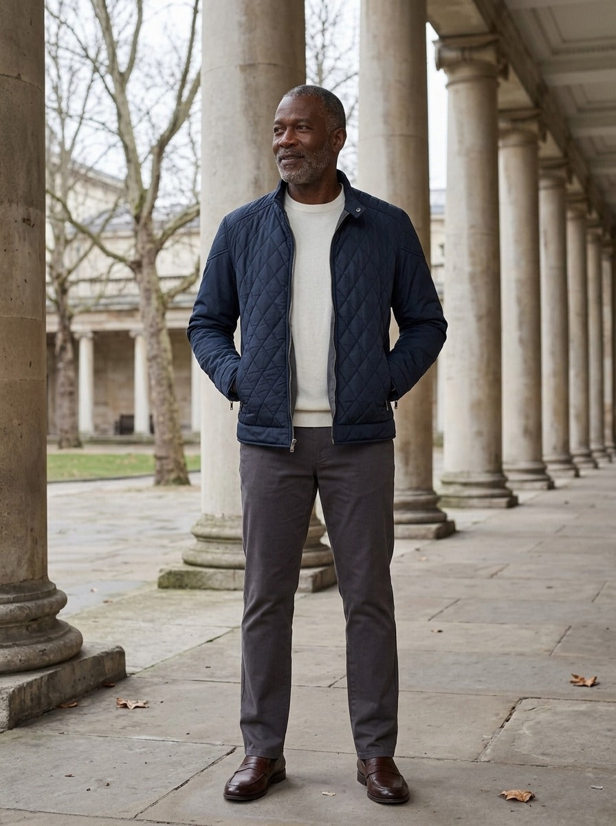 Brantley quilted jacket in Navy, lifestyle in a stone colonnade, Gentlemens Manor