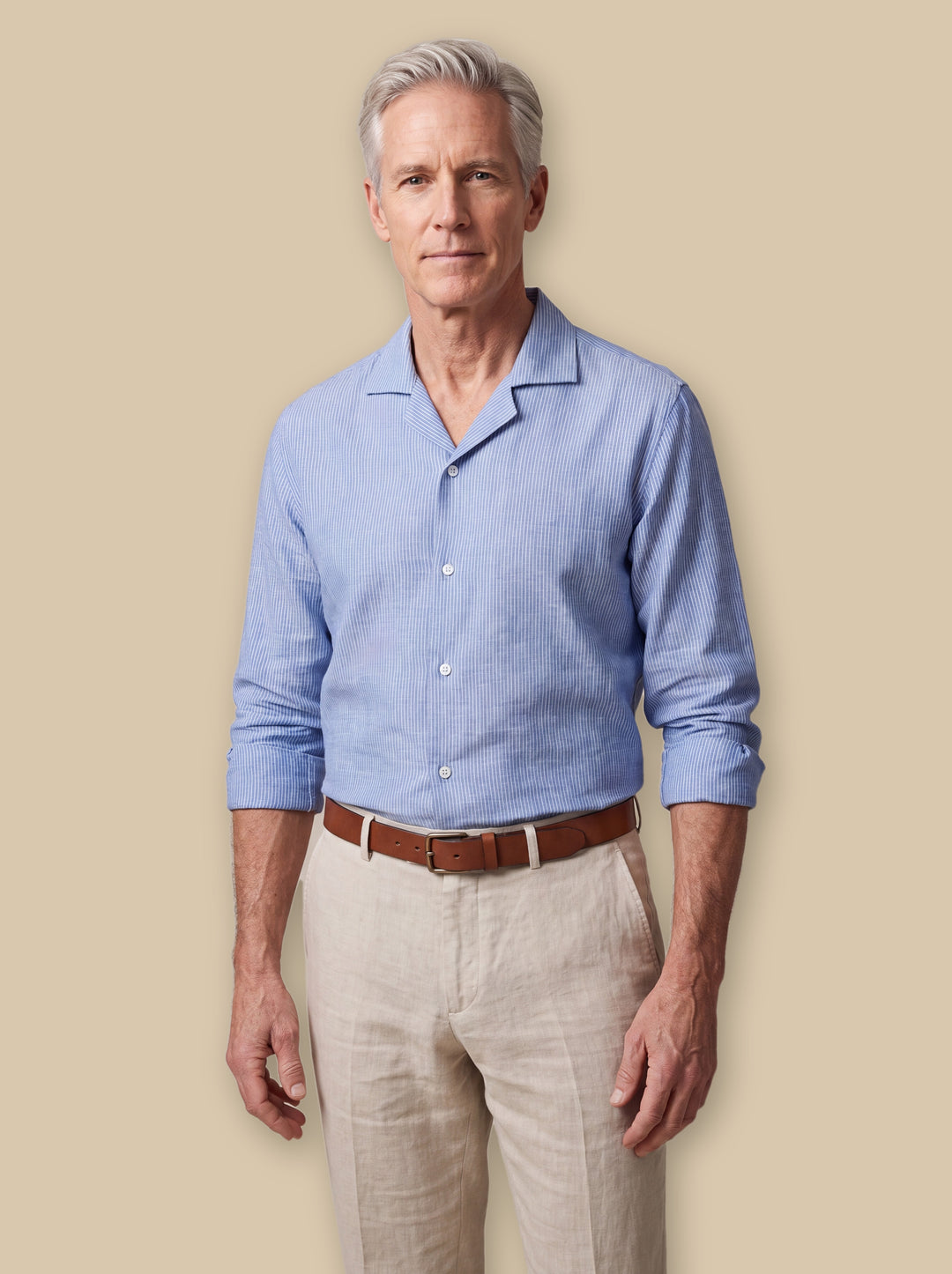 Brewster casual shirt in Blue, worn by a model on a warm sand studio background - Gentlemens Manor