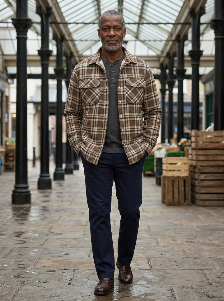 Brigham fleece lined plaid shirt jacket in Brown, lifestyle in a covered market hall, Gentlemens Manor