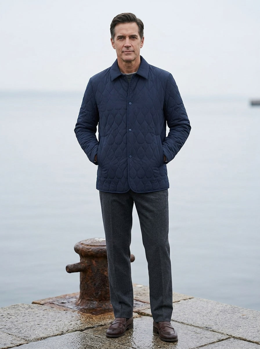 Brooks quilted shirt jacket in Navy, lifestyle on a stone harbor quay, Gentlemens Manor