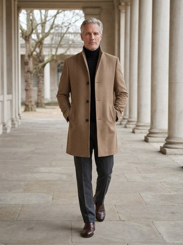 Burgess stand collar wool blend overcoat in Camel, lifestyle in a stone colonnade, Gentlemens Manor