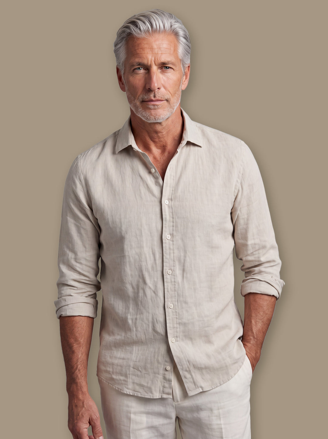 Burton linen shirt in Sand, worn by a model on a warm taupe studio background - Gentlemens Manor