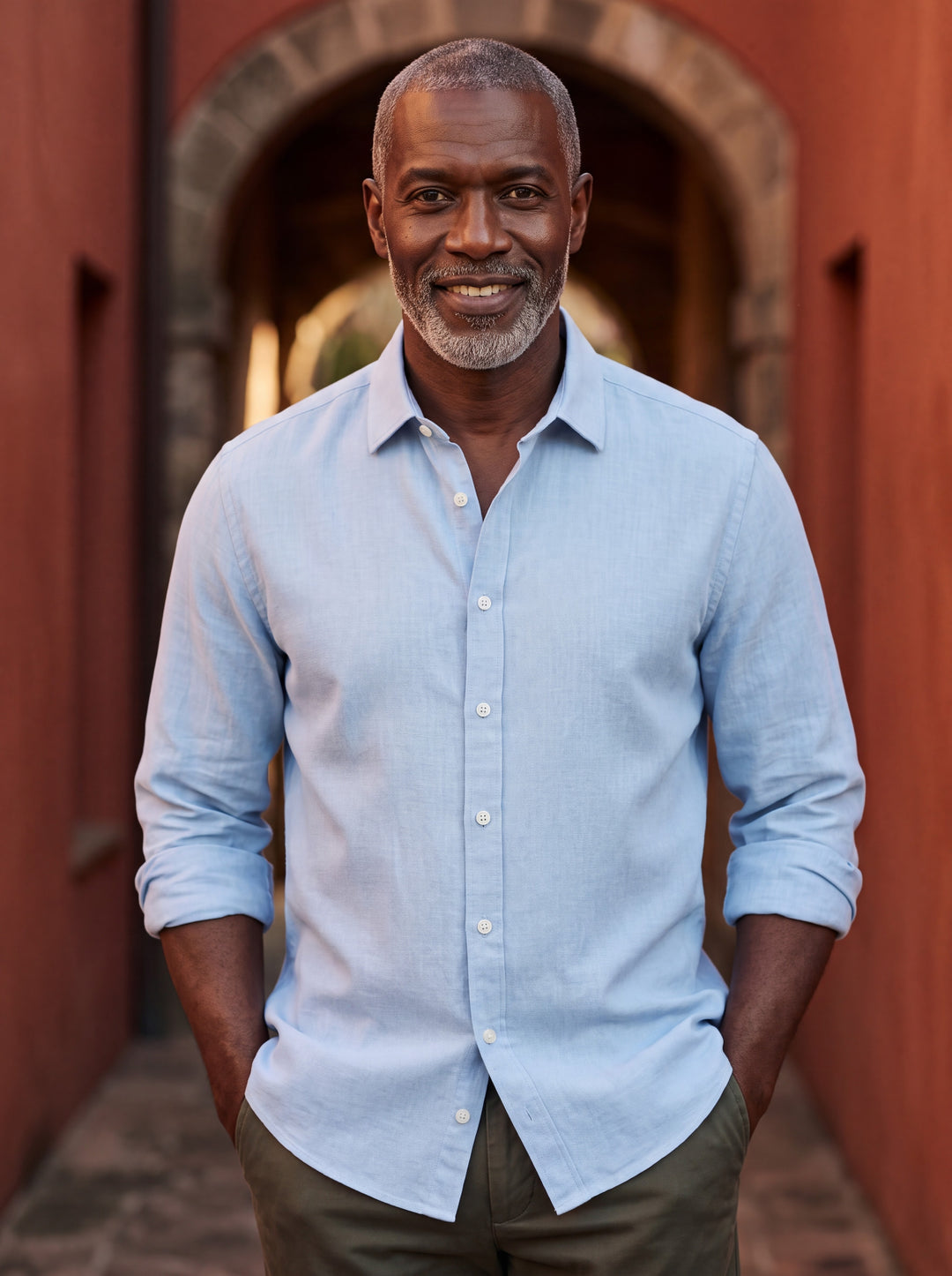Calvin shirt in Light Blue, worn by a model in a Mediterranean setting - Gentlemens Manor lifestyle