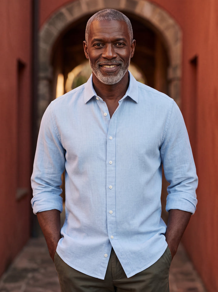 Calvin shirt in Light Blue, worn by a model in a Mediterranean setting - Gentlemens Manor lifestyle