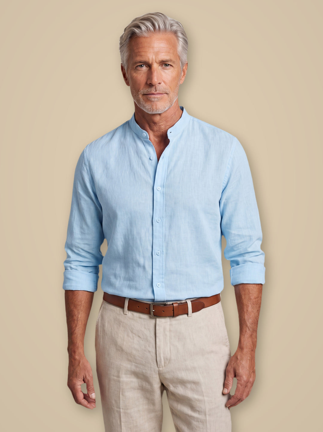 Carl linen shirt in Light Blue, worn by a model on a warm taupe studio background - Gentlemens Manor