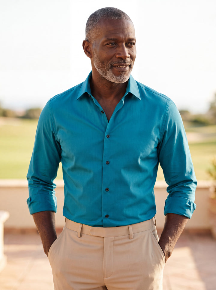 Carter shirt in Blue, worn by a model in a Mediterranean setting - Gentlemens Manor lifestyle