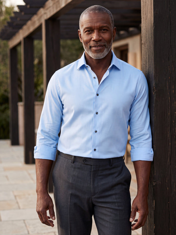 Carter shirt in Light Blue, worn by a model in a Mediterranean setting - Gentlemens Manor lifestyle
