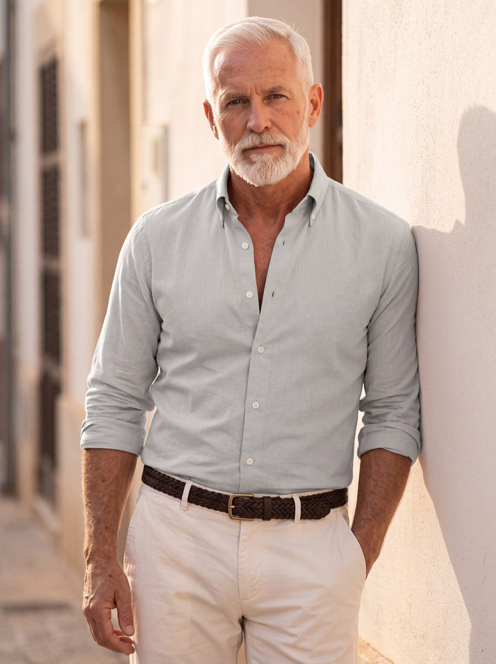 Cary shirt in Grey, worn by a model in a Mediterranean setting - Gentlemens Manor lifestyle