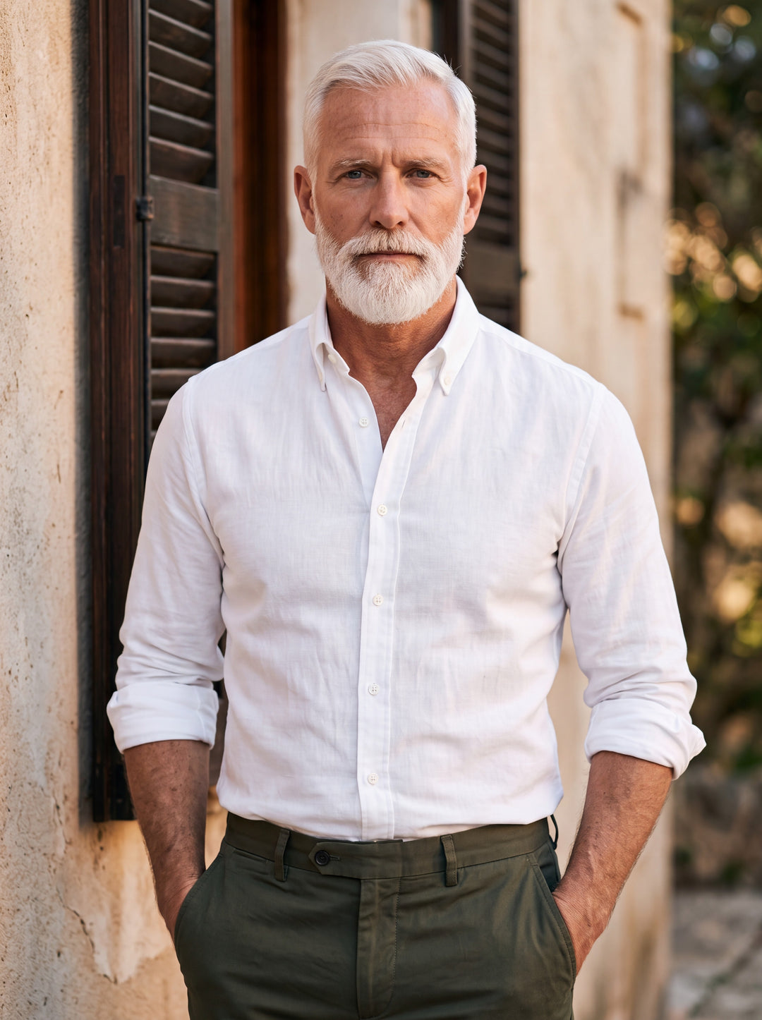 Cary shirt in White, worn by a model in a Mediterranean setting - Gentlemens Manor lifestyle