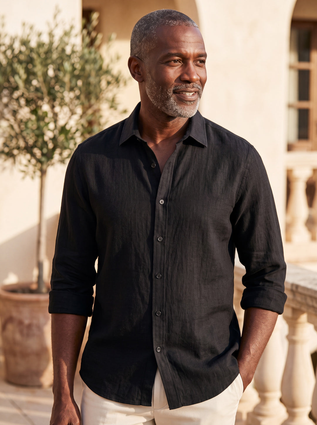 Chance shirt in Black, worn by a model in a Mediterranean setting - Gentlemens Manor lifestyle