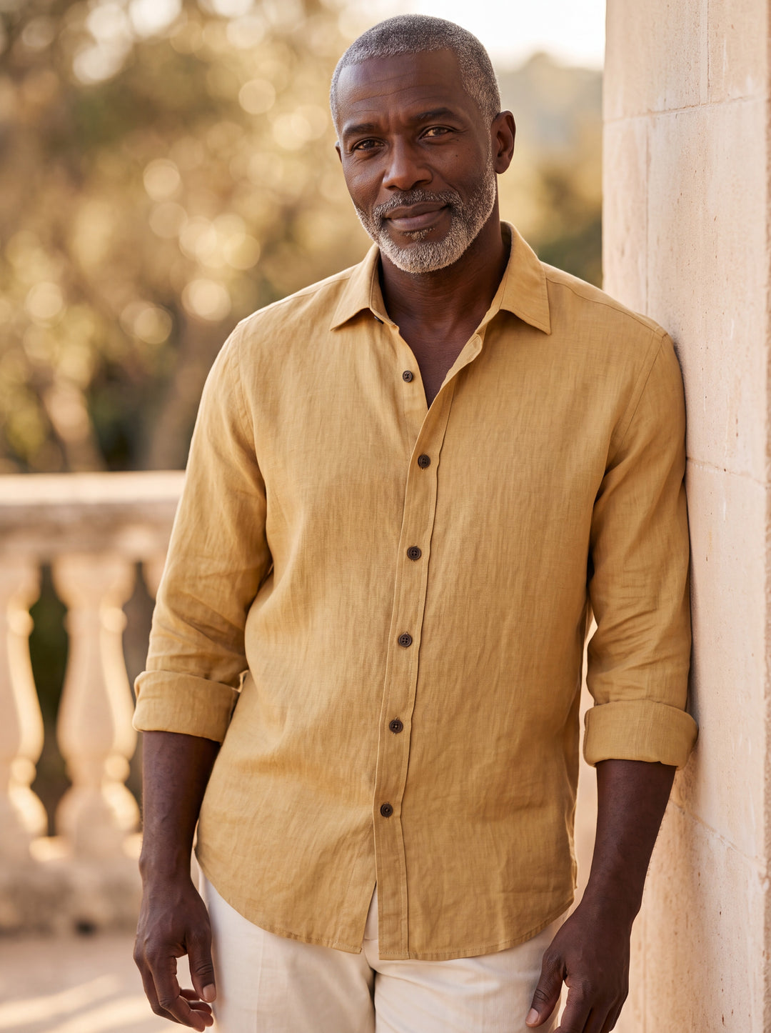 Chance shirt in Mustard, worn by a model in a Mediterranean setting - Gentlemens Manor lifestyle