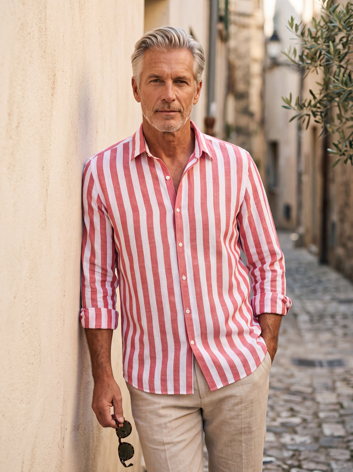 Chandler Men linen shirt in red, worn by a model on a Mediterranean terrace - Gentlemens Manor lifestyle