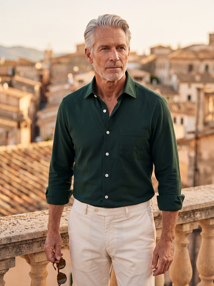 Clifton shirt in Green, worn by a model in a Mediterranean setting - Gentlemens Manor lifestyle