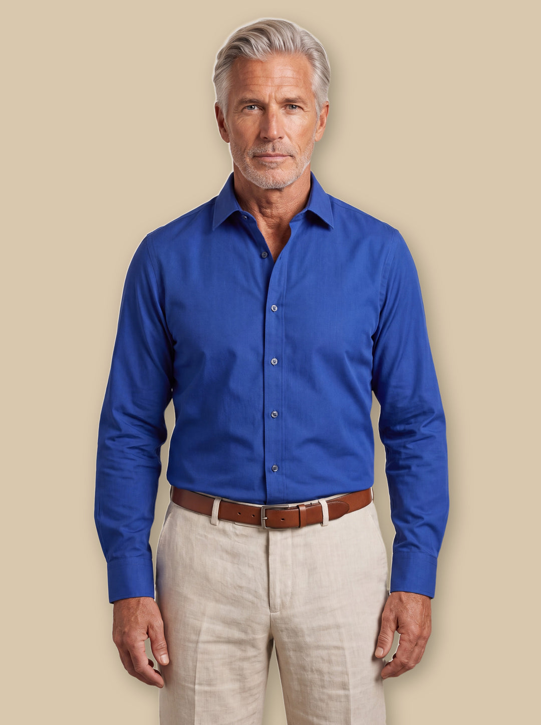 Clinton casual shirt in Blue, worn by a model on a warm sand studio background - Gentlemens Manor
