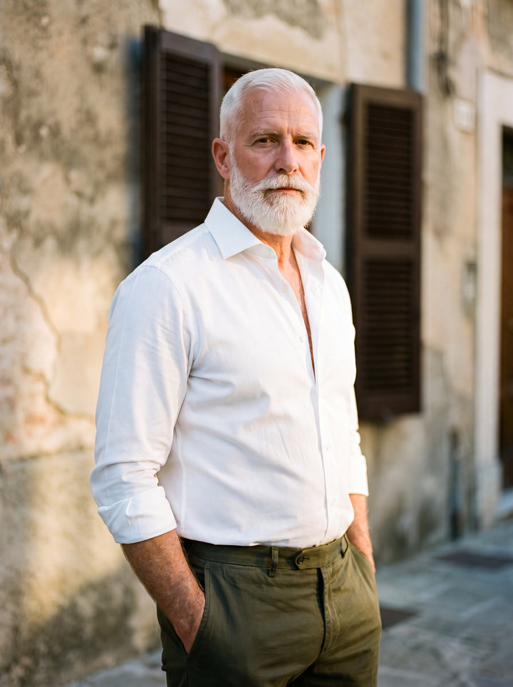 Clinton shirt in White, worn by a model in a Mediterranean setting - Gentlemens Manor lifestyle
