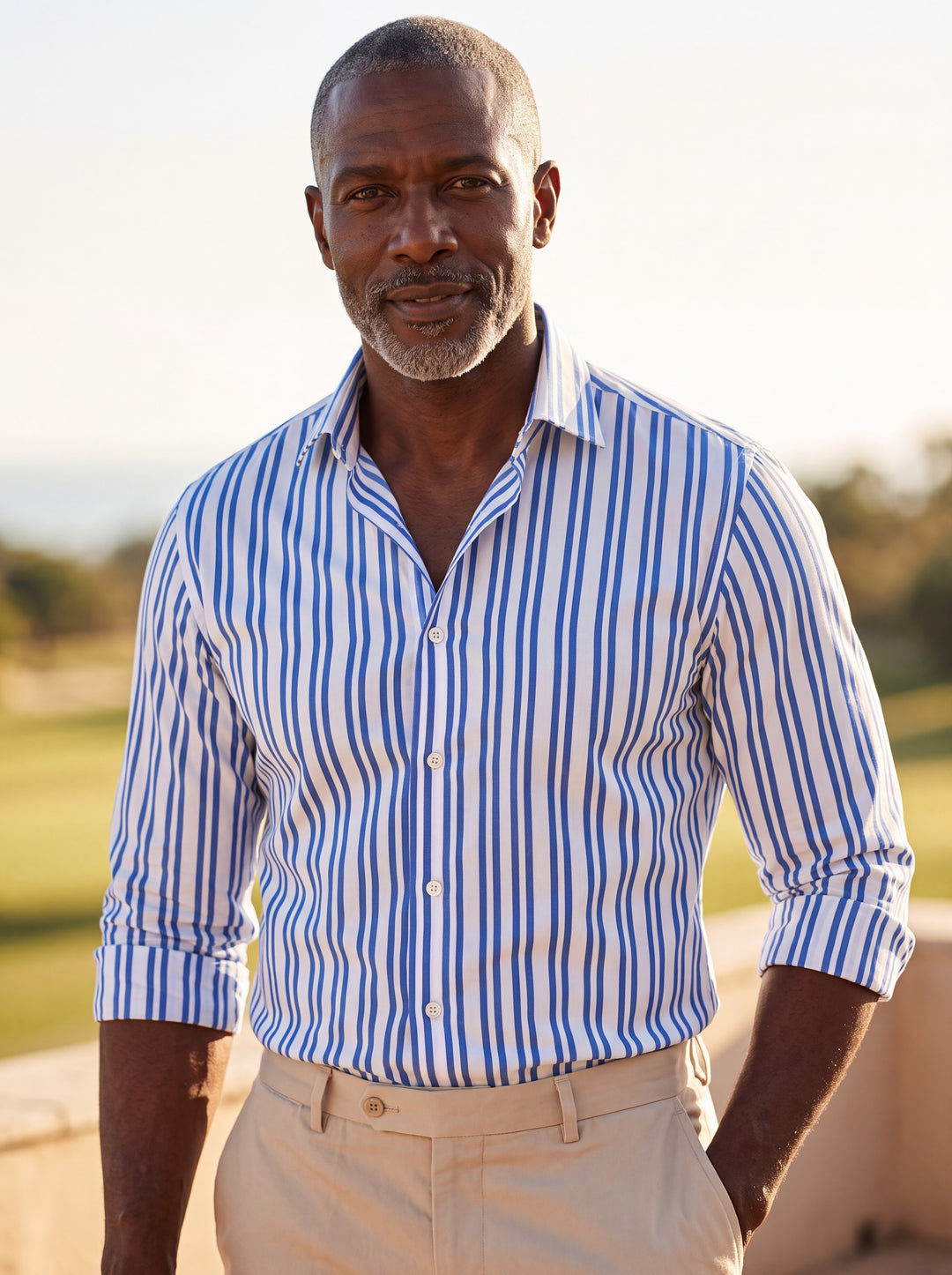 Colton shirt in Blue, worn by a model in a Mediterranean setting - Gentlemens Manor lifestyle