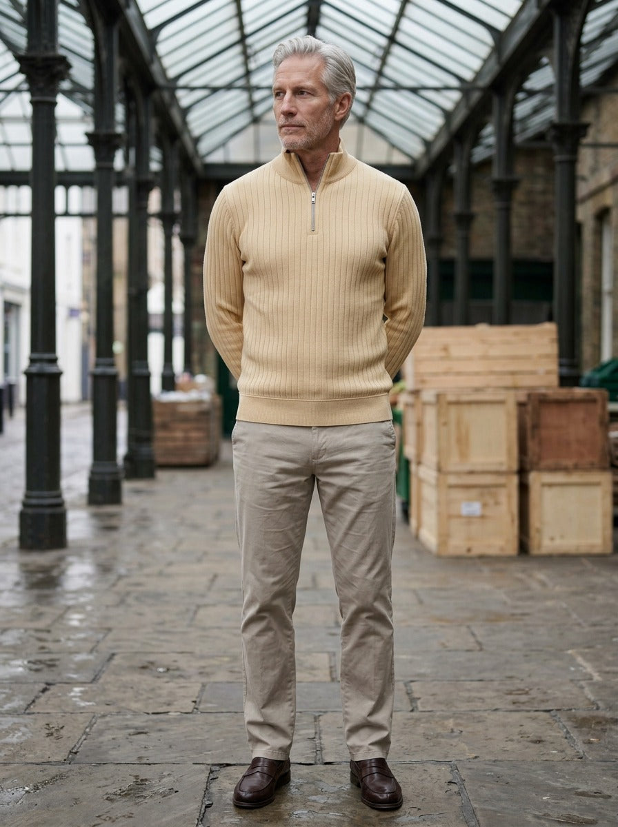 Colwyn half zip sweater in Beige, lifestyle in a covered market hall, Gentlemens Manor