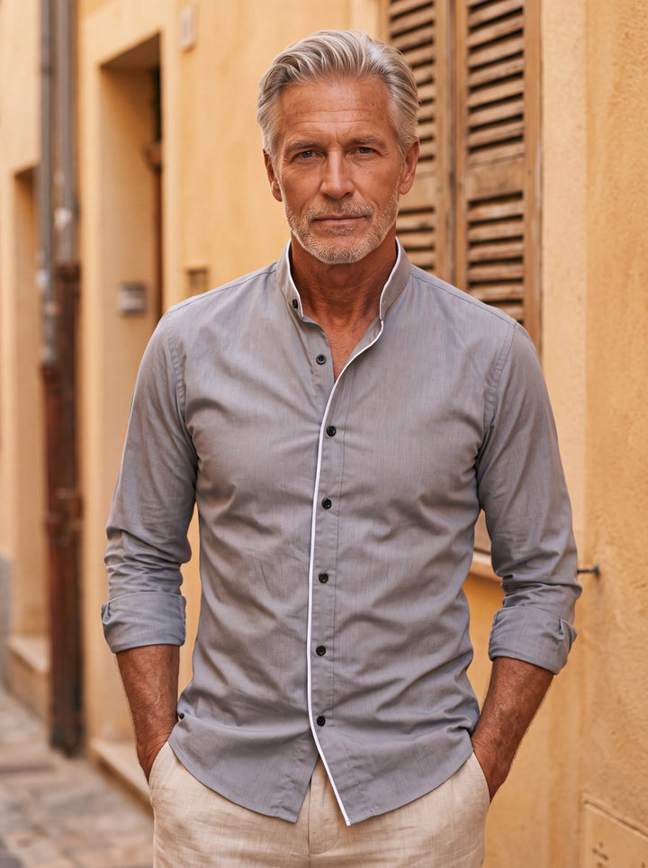 Conrad shirt in Grey, worn by a model in a Mediterranean setting - Gentlemens Manor lifestyle