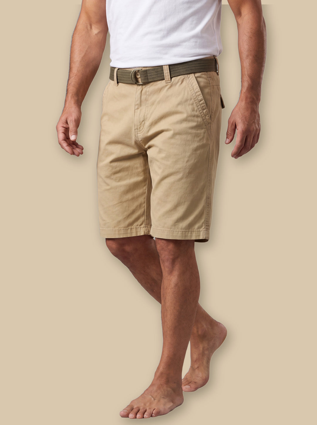 Conrad summer shorts in Sand, worn by a model on a warm sand studio background - Gentlemens Manor
