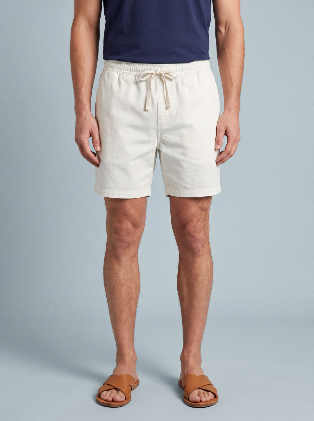 Crawford summer shorts in White, worn by a model on a soft blue studio background, Gentlemens Manor