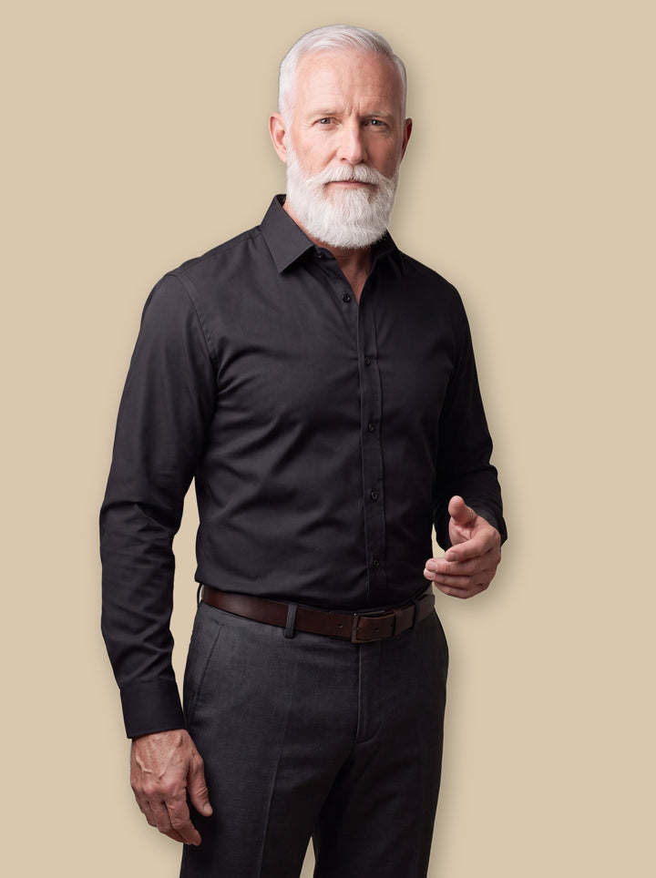 Curtis dress shirt in Black, worn by a model on a warm sand studio background - Gentlemens Manor