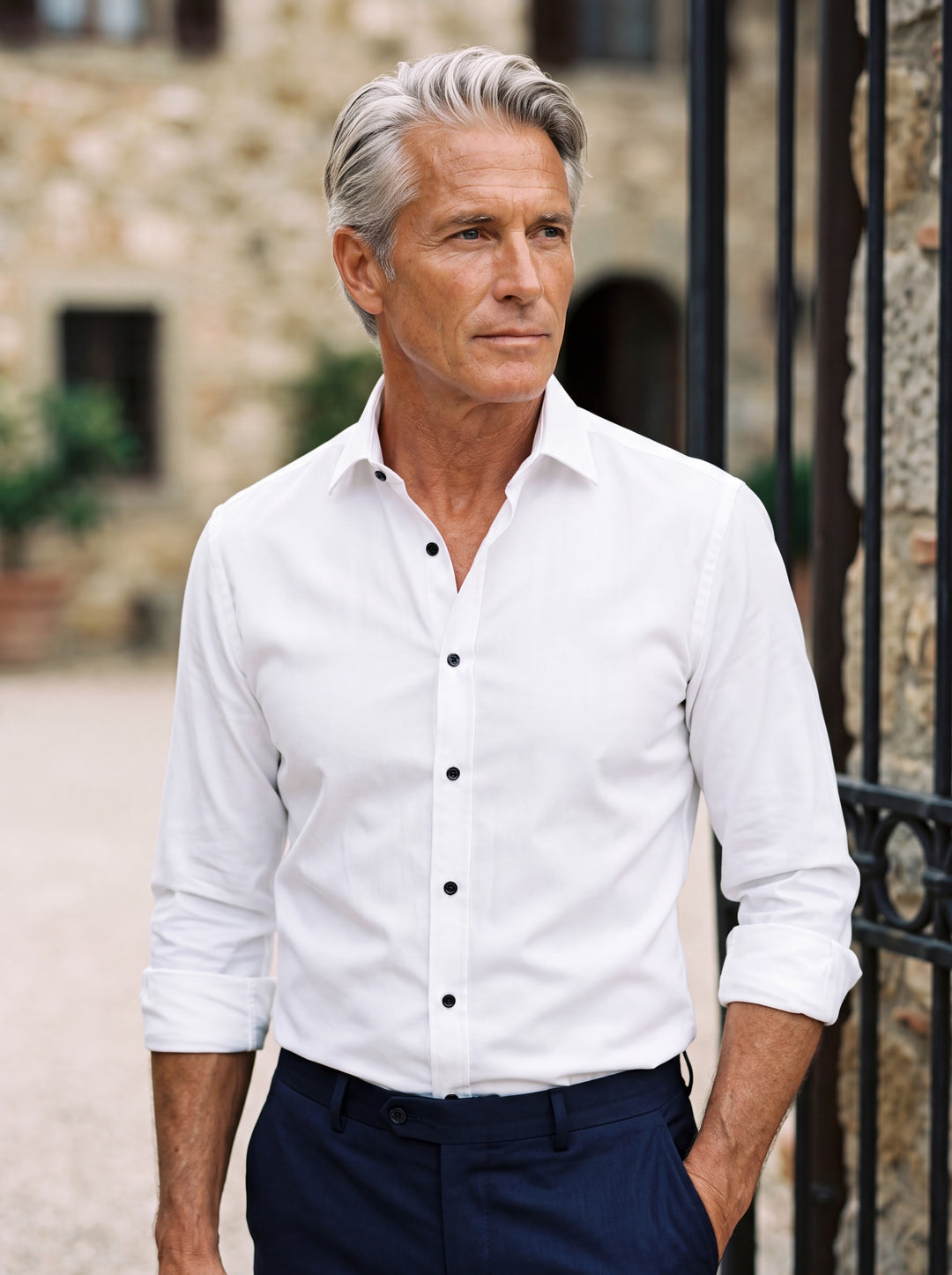 Curtis shirt in White, worn by a model in a Mediterranean setting - Gentlemens Manor lifestyle