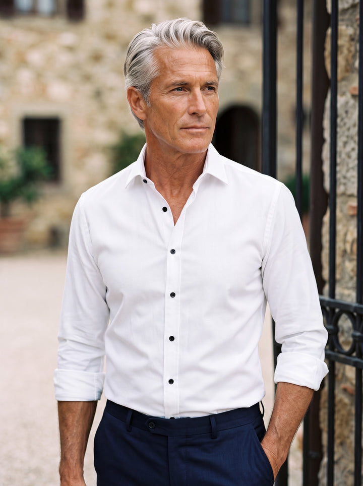 Curtis shirt in White, worn by a model in a Mediterranean setting - Gentlemens Manor lifestyle
