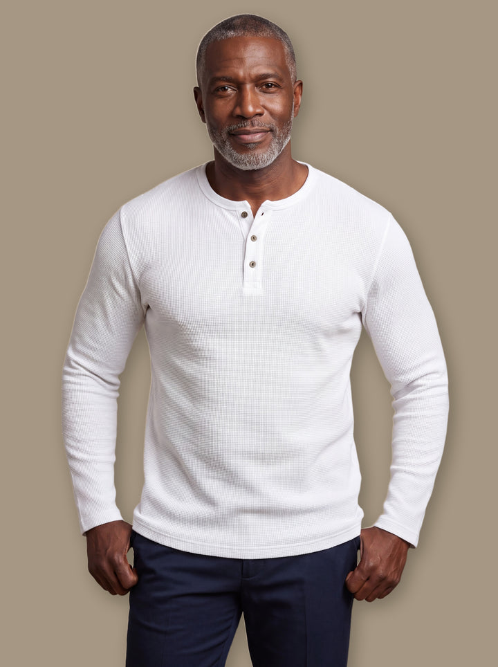 Cyrus henley thermal shirt in White, worn by a model on a warm taupe studio background - Gentlemens Manor
