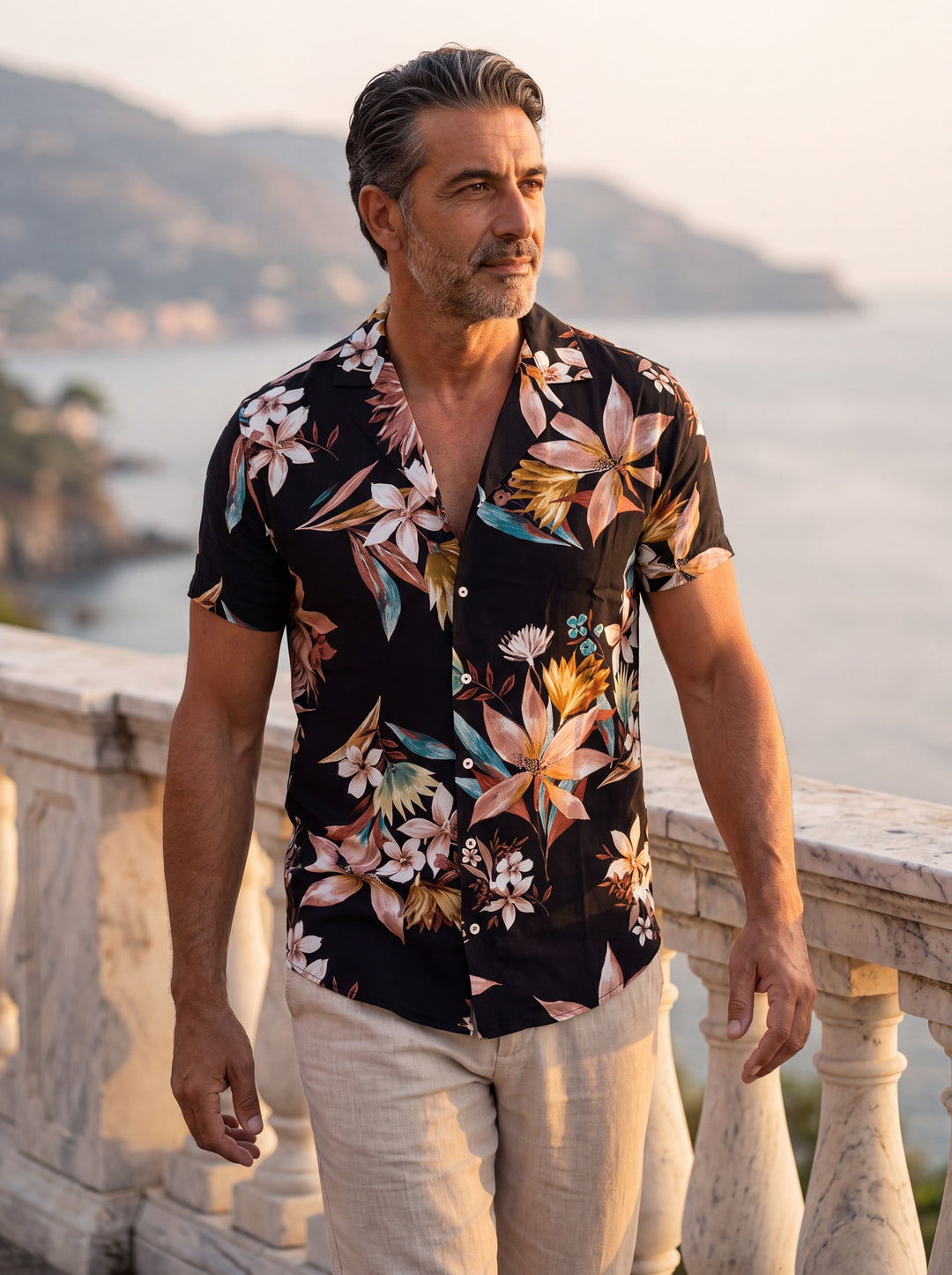 Dale Men short sleeve shirt in Black/Pink, worn by a model on a Mediterranean terrace - Gentlemens Manor lifestyle