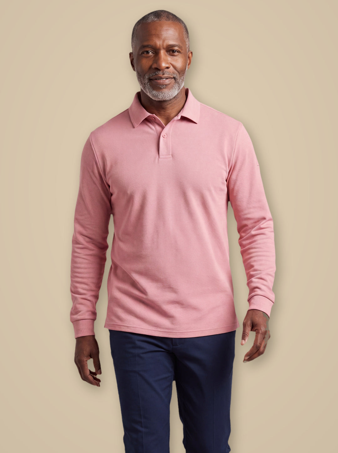 Dalton polo shirt in Light Blue, worn by a model on a warm taupe studio background - Gentlemens Manor
