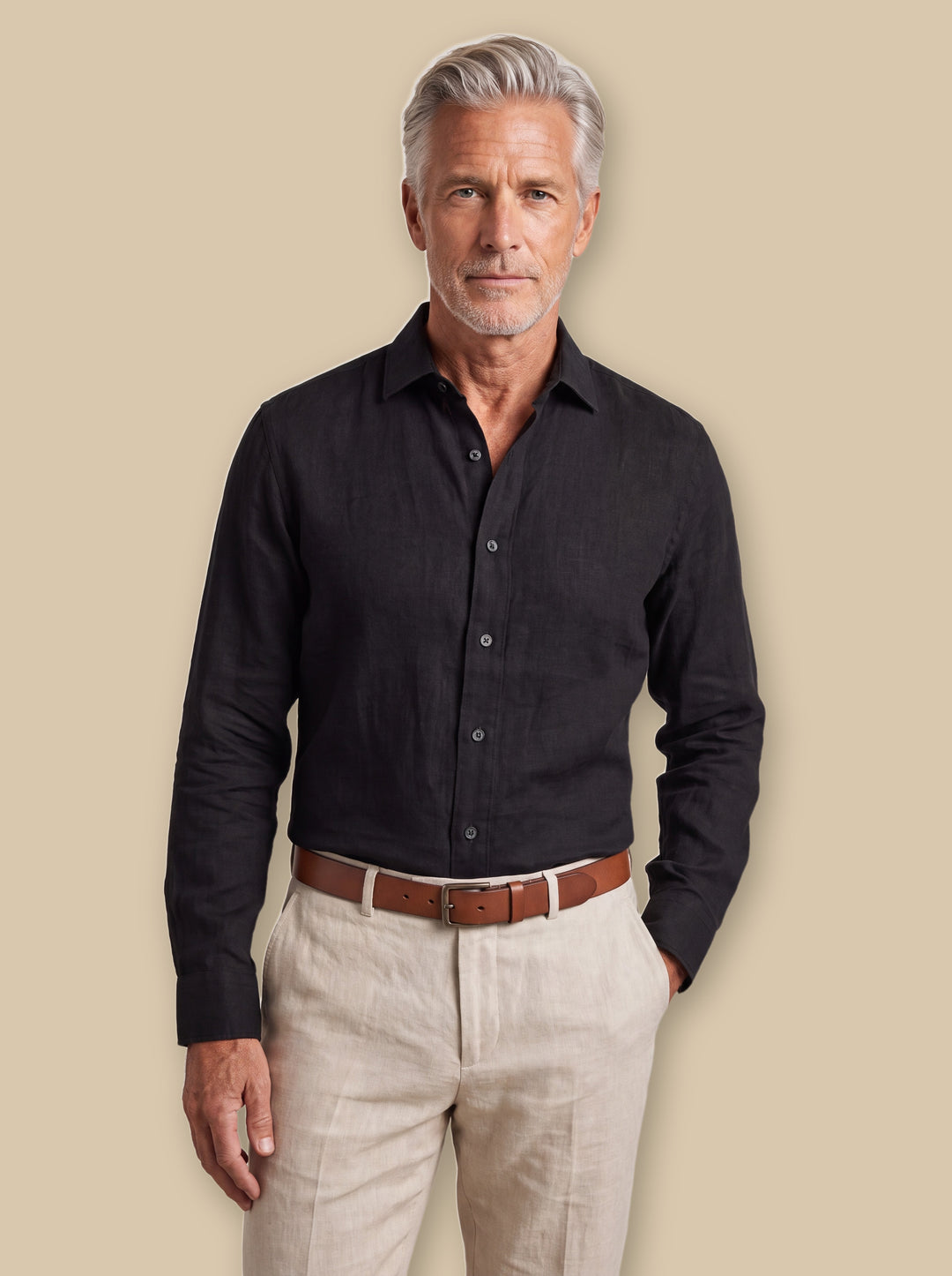 Dane linen shirt in Black, worn by a model on a warm sand studio background - Gentlemens Manor